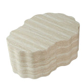 Close-up of beige marble finish on round nesting coffee tables with scalloped edges, ideal for stylish living room accents