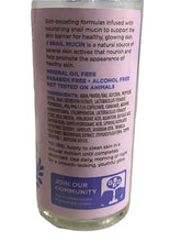 Back label of a skincare product bottle with text and branding on a white background