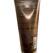 Back view of Glow It Gradual Glow Body Lotion Medium to Tan 6.7 fl oz showing product description, usage instructions, and ingredients.