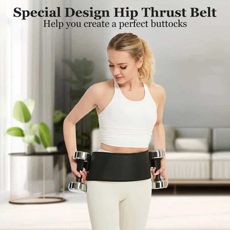Woman wearing a black hip thrust belt while holding dumbbells in a home setting.