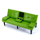 Green leather sofa bed with cup holders and cushions on a white background