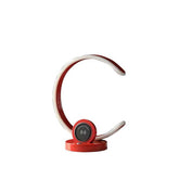 Red and white Bluetooth headset on a white background