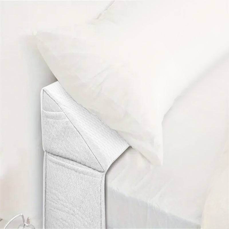White wedge pillow for bed corner design close up